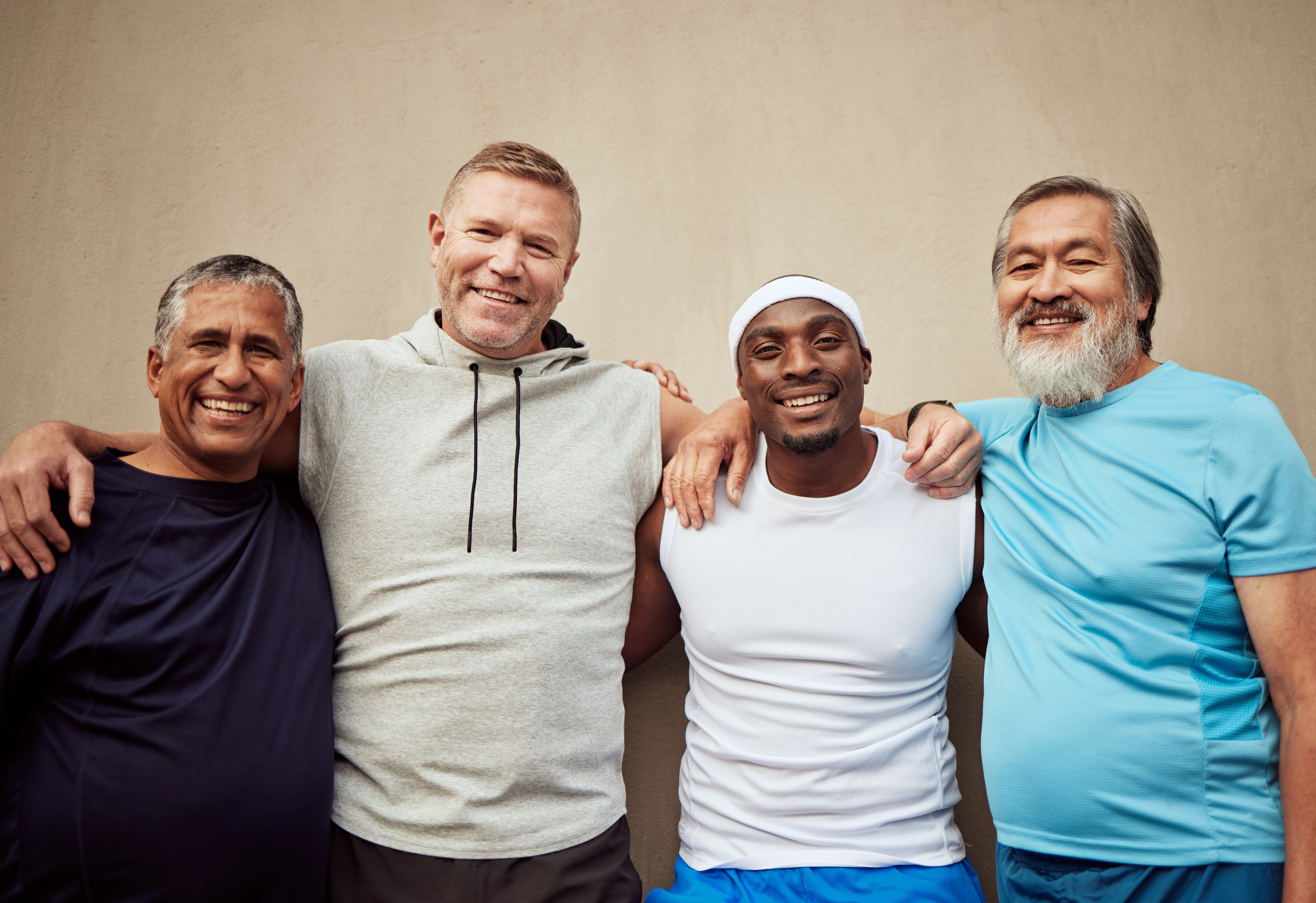happy-men-exercise-group-and-portrait-in-city-on-2023-11-27-05-30-07-utc.jpg